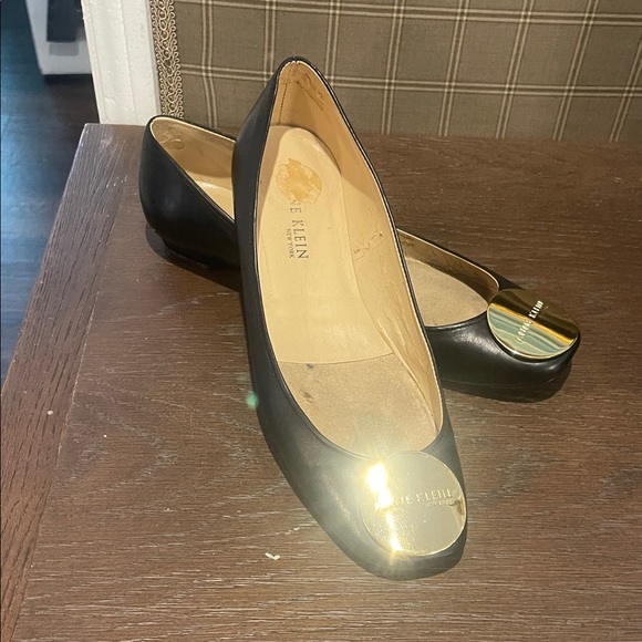 Anne Klein Women's Black Flats with Gold Medallion Accent - Picture 1 of 9